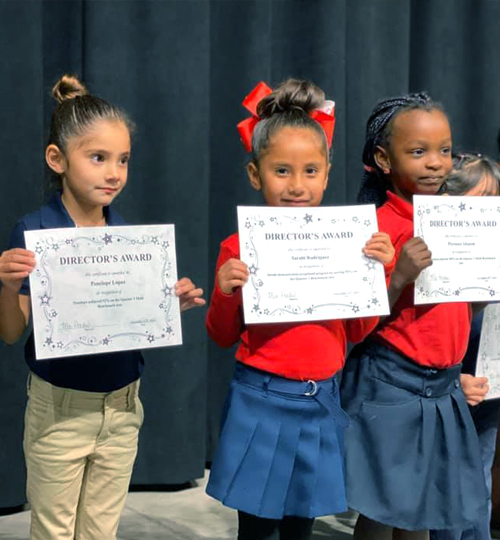 Photo: Students holding awards