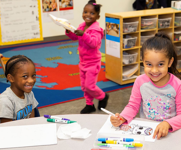 Photo: Preschool students coloring