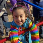 Photo: Child playing on bars