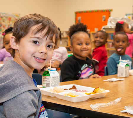 Photo: Student eating at table