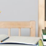 Photo: Pencils and an apple on teacher's desk